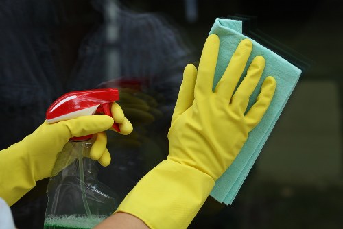 After builders cleaning team removing construction dust in Kensington home