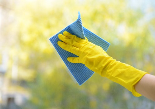 Professional office cleaners working in a Kensington workplace