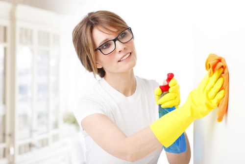 Supervisor checking workplace safety measures in a cleaning area