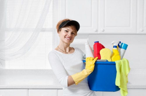 Staff member reviewing booking details before a cleaning appointment