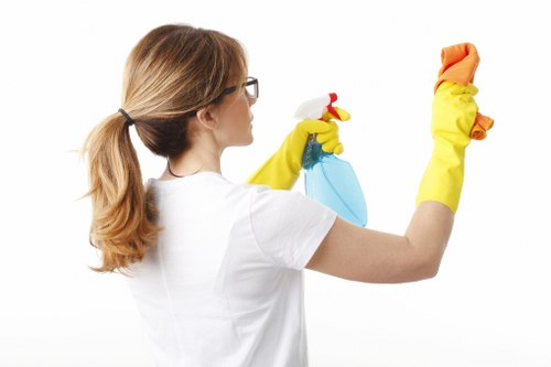 Eco-friendly cleaners in Kensington preparing a spotless room